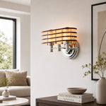 Afbeelding laden in galerijweergave, Bauhaus amber LED wall sconce illuminated in a bright living room
