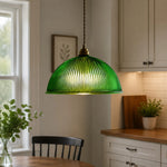 Cargar imagen en el visor de la Galería, Emerald green ribbed glass pendant installed above a kitchen counter