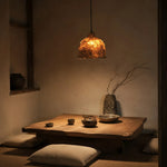Cargar imagen en el visor de la Galería, Warm paper pendant light installed above a low table setting