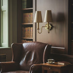 Load image into Gallery viewer, Duova Double Sconce – Antique Brass Metal and Linen Shades for Bedroom or Study