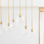 Load image into Gallery viewer, Lumivelle Sculptural 7-Light Chandelier – Adjustable Height Modern Glass Pendant