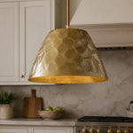 Cargar imagen en el visor de la Galería, Hammered brass pendant light above a kitchen island