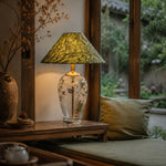 Load image into Gallery viewer, Floral glass table lamp in a calm lounge corner