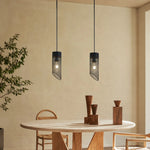 Cargar imagen en el visor de la Galería, Black mesh stone pendant light installed above a round dining table