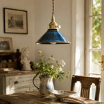 Cargar imagen en el visor de la Galería, Blue ceramic pendant light above a vintage tea table near a window