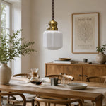 Cargar imagen en el visor de la Galería, Vintage brass glass pendant lamp above a warm dining table