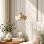 Cargar imagen en el visor de la Galería, Leather petal pendant light beside a soft upholstered bed