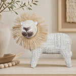 Załaduj obraz do przeglądarki galerii, Resin lion ornament displayed with warm neutral home decor