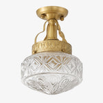 Afbeelding laden in galerijweergave, Clear pressed glass Art Deco ceiling light with brass finish