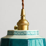 Afbeelding laden in galerijweergave, brass socket and braided cord detail on ceramic pendant light