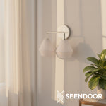 Load image into Gallery viewer, Merin Metal & Glass Sculptural Wall Sconce for Vanity & Bathroom