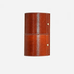 Cargar imagen en el visor de la Galería, Brown leather wrapped cylinder wall sconce on clean background