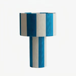 Carica l'immagine nella visualizzazione Galleria, Blue and white striped woven shade table lamp on a white background