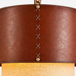 Cargar imagen en el visor de la Galería, Lower edge detail of brown leather drum pendant shade