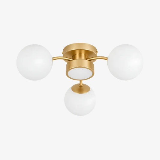 Lampa sufitowa LED montowana bezpośrednio do sufitu, z kloszem z litego mosiądzu i szklaną kulą