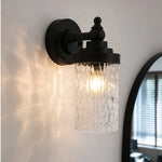 Cargar imagen en el visor de la Galería, Averra ribbed glass wall light on a protected garden-side wall