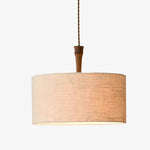 Bild in die Galerieansicht laden, Natural linen drum pendant lamp with wood socket detail