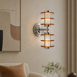 Załaduj obraz do przeglądarki galerii, Vertical amber acrylic chrome wall lamp installed in a living room