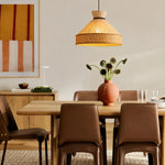 Bild in die Galerieansicht laden, Warm fabric cone pendant light in a dining room with wall art