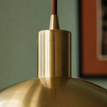 Load image into Gallery viewer, Close view of brass pendant stem and ceiling connection