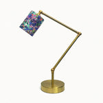 Cargar imagen en el visor de la Galería, Adjustable brass-tone table lamp with purple botanical fabric shade