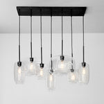 Load image into Gallery viewer, Lumivelle Sculptural 7-Light Chandelier – Adjustable Height Modern Glass Pendant