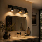 Bild in die Galerieansicht laden, Black three-head adjustable wall light above a bathroom mirror