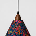Carica l'immagine nella visualizzazione Galleria, Close-up of walnut-tone wood holder and dark botanical Liberty fabric