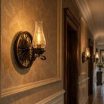 Załaduj obraz do przeglądarki galerii, Black two-head wall sconce lighting a paneled hallway