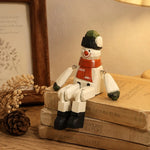 Carica l'immagine nella visualizzazione Galleria, Hand-carved wooden santa snowman ornament styled on a tabletop edge