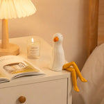 Carica l'immagine nella visualizzazione Galleria, Hand-carved wooden seagull ornament styled on a tabletop edge