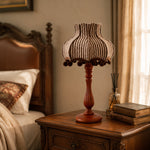Carica l'immagine nella visualizzazione Galleria, Vintage striped table lamp on a bedroom bedside table