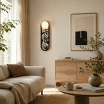 Załaduj obraz do przeglądarki galerii, Fabric wall sconce above a console in a bright room