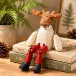 Carica l'immagine nella visualizzazione Galleria, Hand-carved wooden christmas reindeer with red legs ornament styled on a tabletop edge