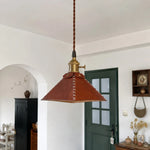 Załaduj obraz do przeglądarki galerii, Leather pyramid pendant lamp in an arched room setting