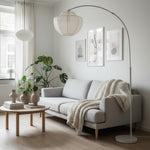 Bild in die Galerieansicht laden, Lumifil Bogen-Stehleuchte mit Textil-Mesh-Schirm – Metallständer für sanfte Ambientebeleuchtung im Wohnzimmer