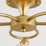 Load image into Gallery viewer, Brass center connection and curved arm detail