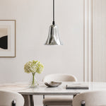 Afbeelding laden in galerijweergave, Bell-shaped chrome pendant light in a bright dining space