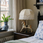 Cargar imagen en el visor de la Galería, Vintage rocking horse table lamp styled on a bedroom nightstand