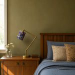 Cargar imagen en el visor de la Galería, Purple floral table lamp on a bedside table beside a wooden bed