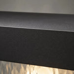 Załaduj obraz do przeglądarki galerii, Close-up of matte black aluminum surface and upper frame edge