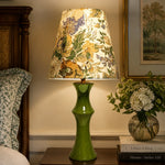 Cargar imagen en el visor de la Galería, Beige floral table lamp on a bedroom side table