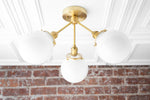 Load image into Gallery viewer, Glorica Glass Chandelier - Brass Globe Ceiling Light with Opal Shade