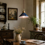 Cargar imagen en el visor de la Galería, Blue ceramic pendant light installed over a rustic dining table
