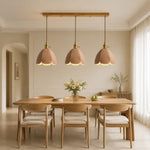 Cargar imagen en el visor de la Galería, Three natural leather pendant lights in a light dining room