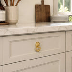 Afbeelding laden in galerijweergave, Brass ring pull on a kitchen drawer