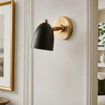 Załaduj obraz do przeglądarki galerii, Black and gold wall sconce on a refined wall