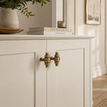 Afbeelding laden in galerijweergave, Paired antique brass handles on cabinet doors