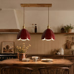 Cargar imagen en el visor de la Galería, Two brown leather pendant lights above a dining table