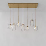 Load image into Gallery viewer, Lumivelle Sculptural 7-Light Chandelier – Adjustable Height Modern Glass Pendant